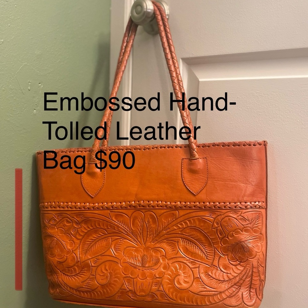 Embossed leather bag, used